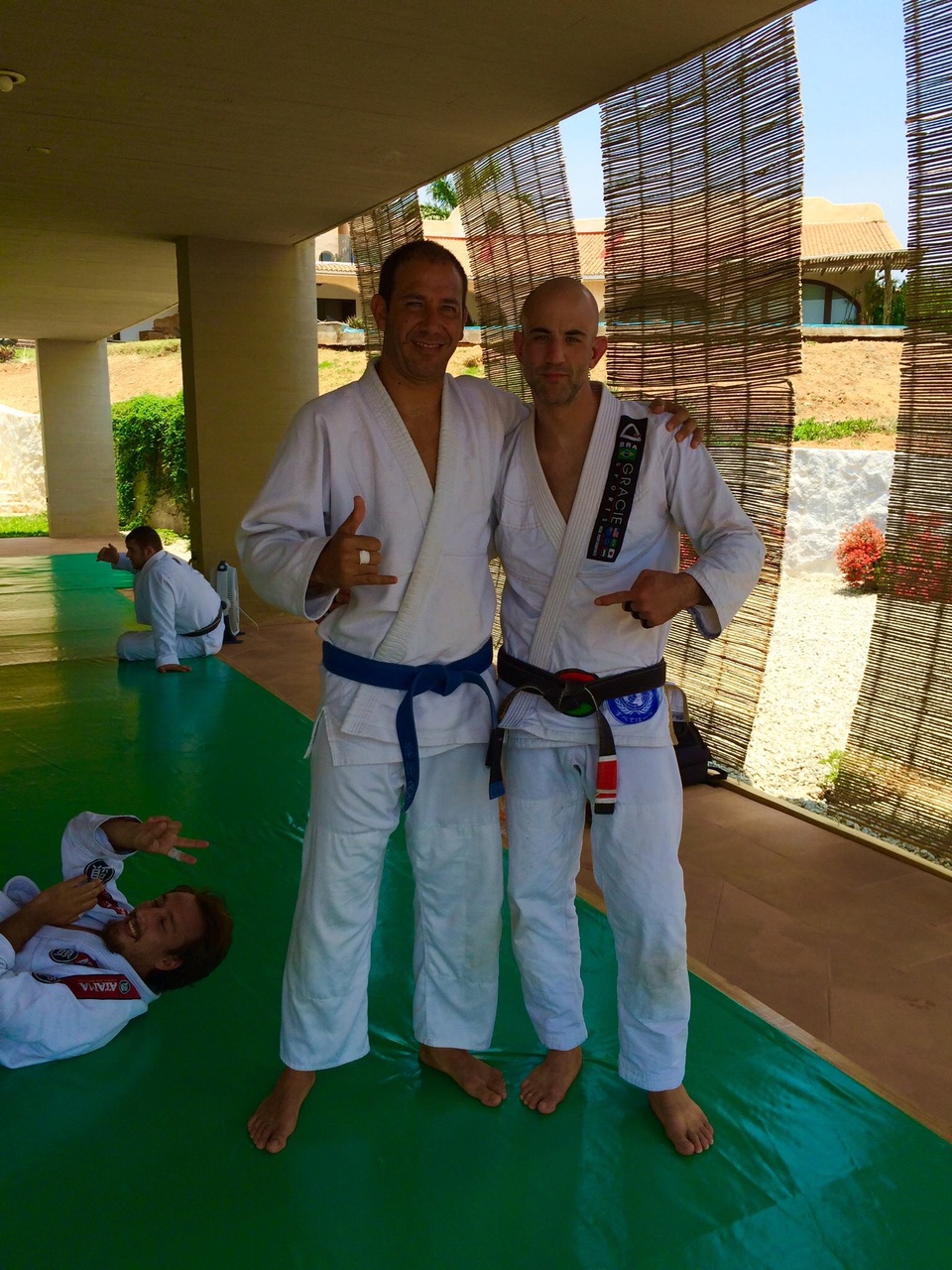 Adrian received his blue belt from Brad at the last day of camp!