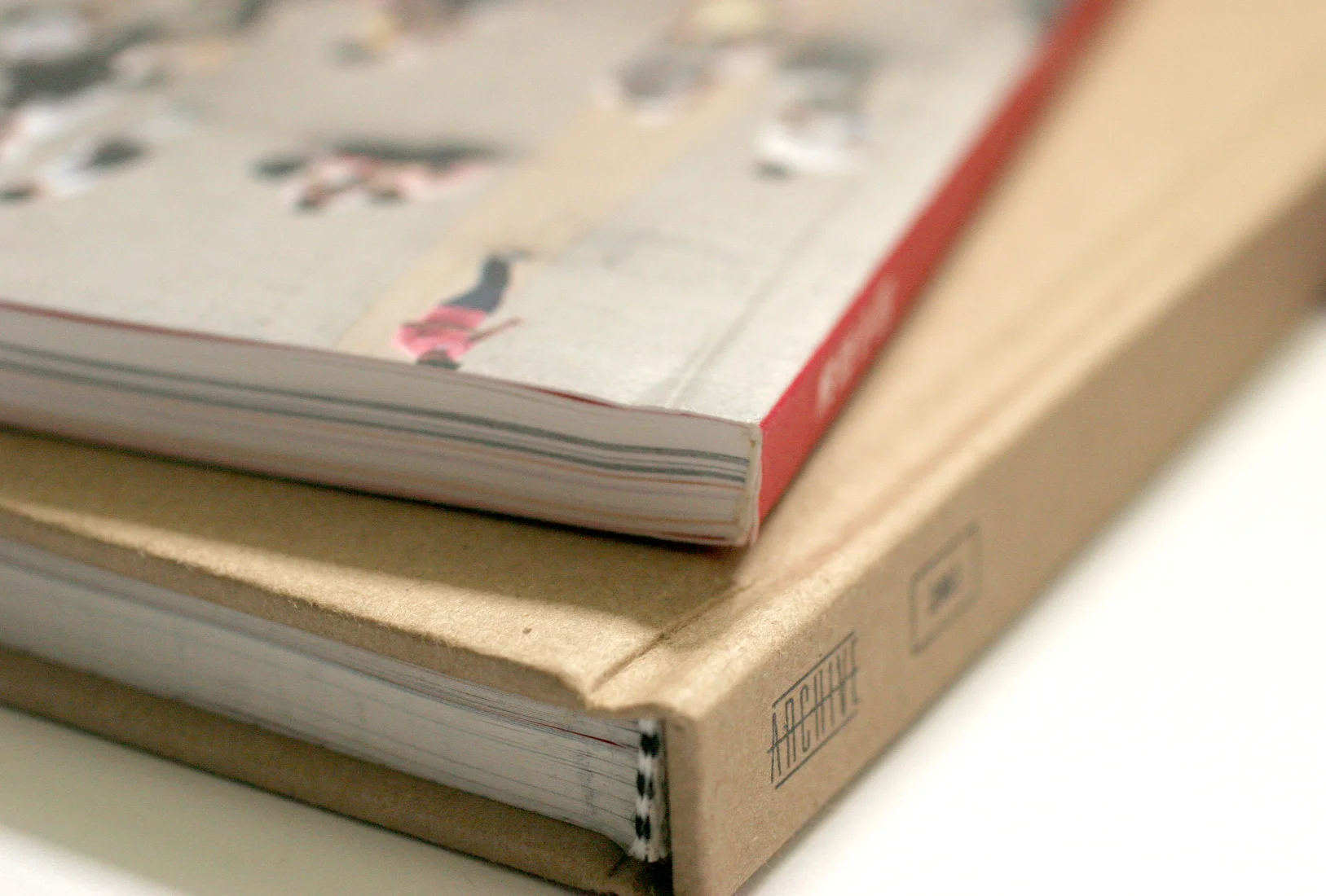 Perfect binding (top) and case binding (bottom)