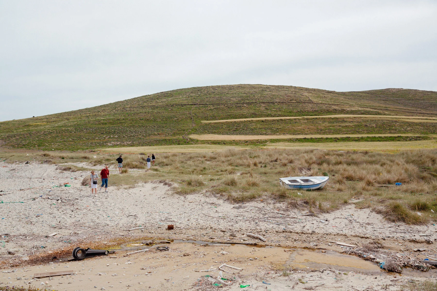 The uninhabited island of Rineia, with a beach full of trash and gigantic snake skulls