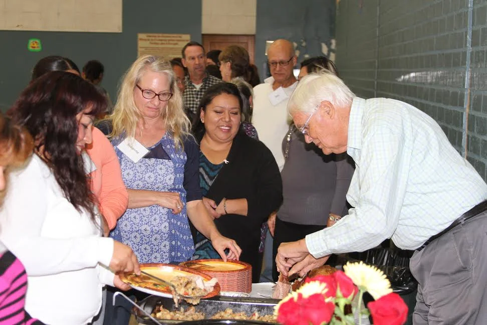 Jim Crawford cooked two turkeys the day before and served over 80 people.