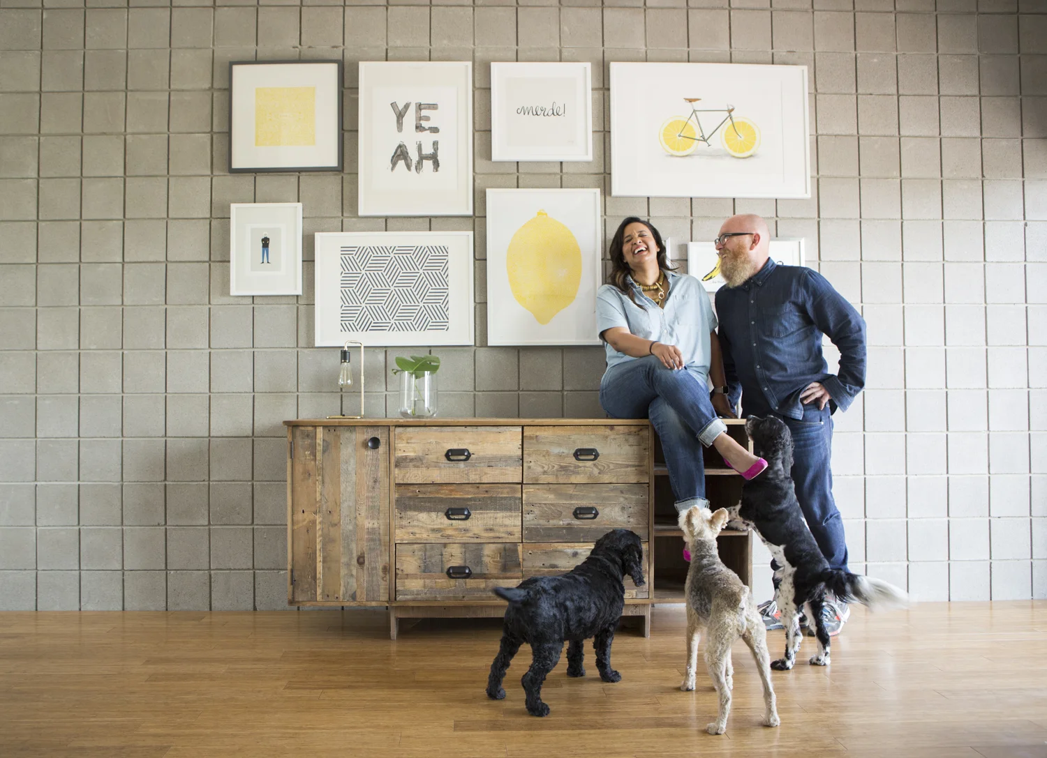 In addition to swooning over the aesthetics of this couple's space, I love this moment. For me, it's a joyful slice of their family's dynamic. They obviously have fun together and their pets are their beloved family members. This photo makes me happy.