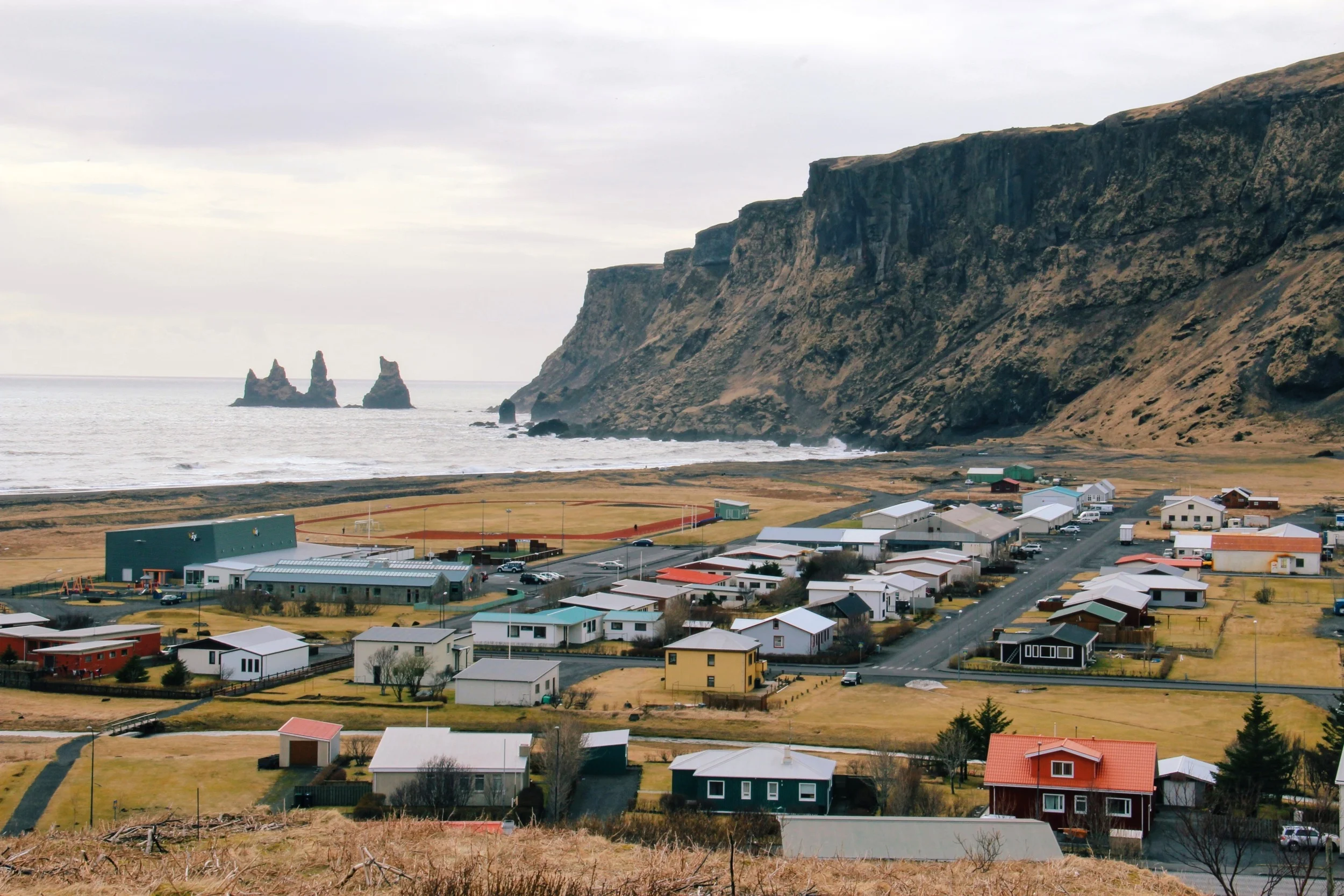 Iceland's southern town of Vik is surrounded by scenic cliffs and black sand beaches.