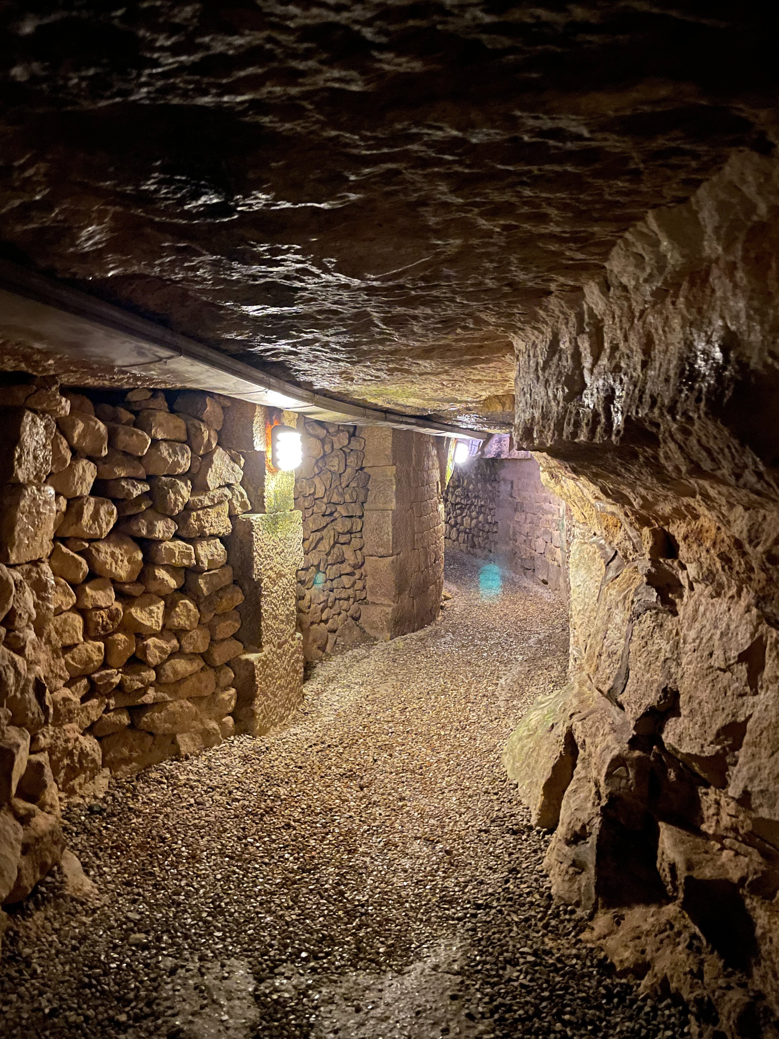 catacombs of paris tunnel things to do.JPG