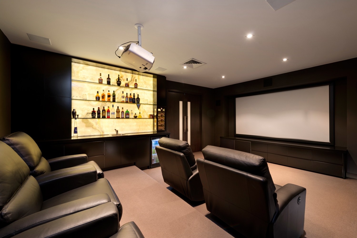 Theater room with feature drinks cabinet.