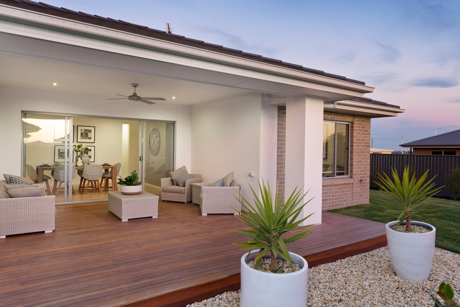 Outdoor entertainment zone and deck in to dining room.