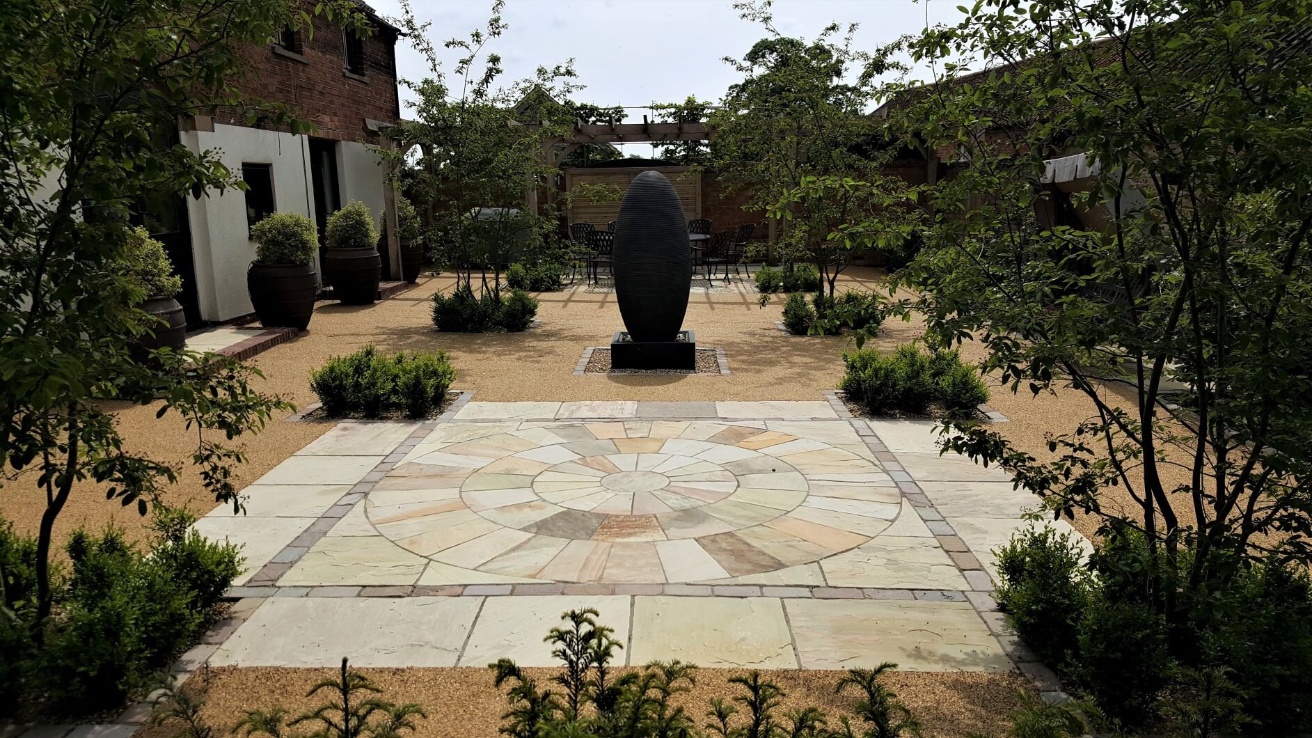 Paving and water feature in courtyard garden.jpg