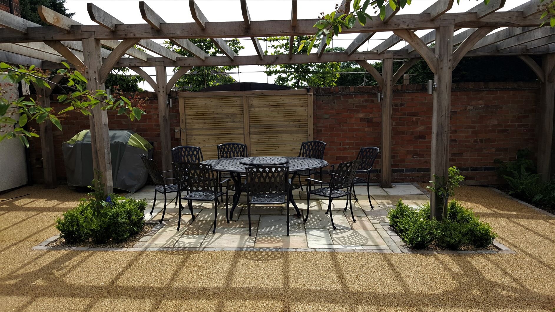 Seating under arbour in courtyard garden.jpg