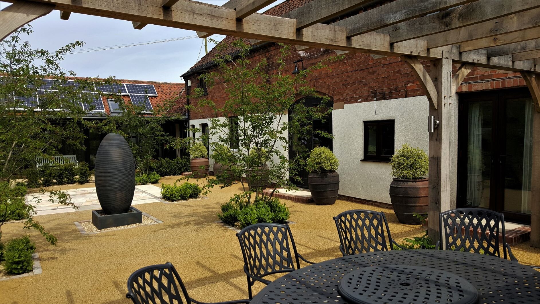 View across courtyard from under arbour.jpg