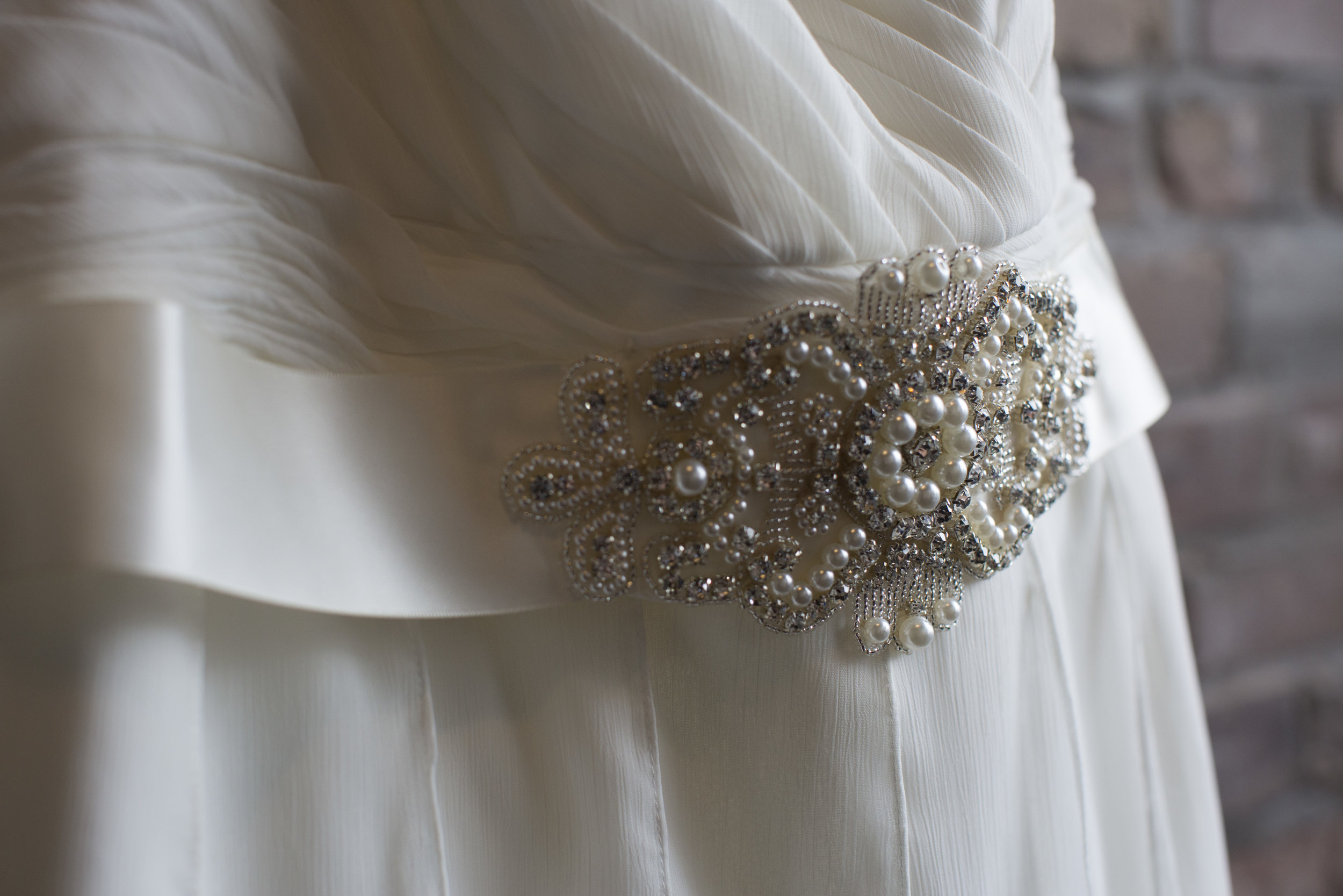 Carey added a touch of pearls & beads to her dreamy dress!