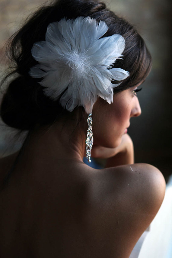Can you tell we like feathers? Etsy: shopjaxiebridal