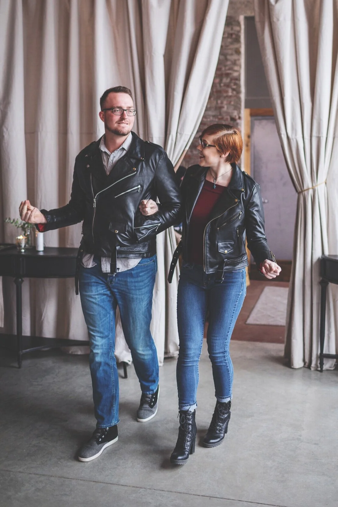 Leather jacket lovers, Kati & Dustin, rock their way down the aisle, hand-in-hand, before saying “I do”.