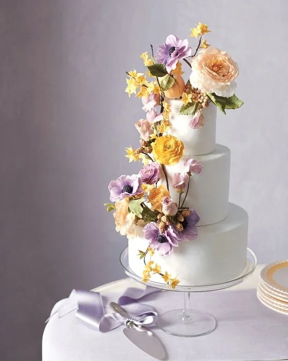 small_wedding_trends_august_look_book_wedding_cake_wild_flowers.jpg