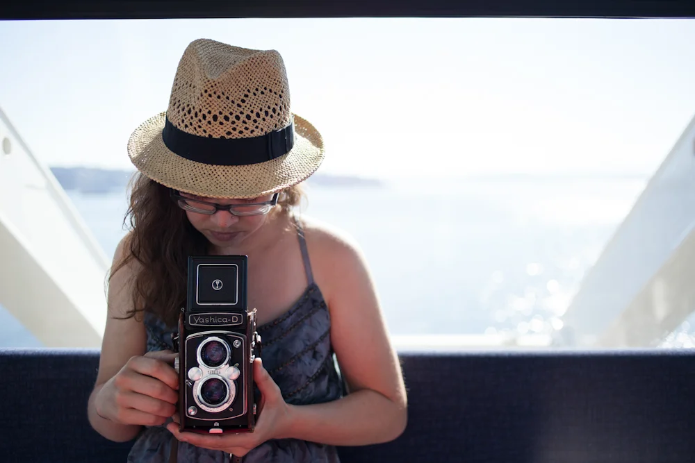 I don't think I have any photos of Vanessa without this hat and camera ;)