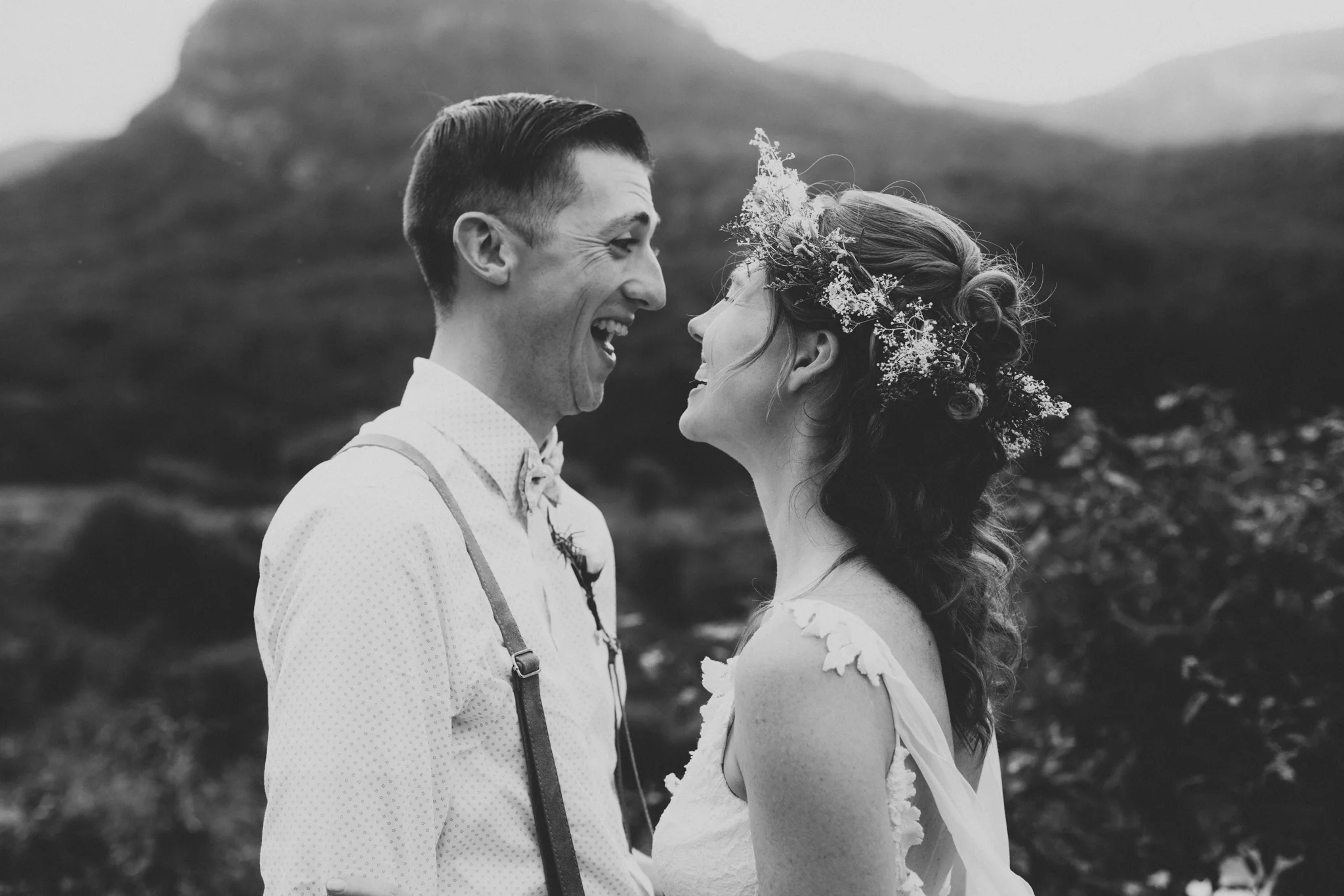 A couple laughs in after getting married at Lake Lure Inn outside of Asheville, NC. 