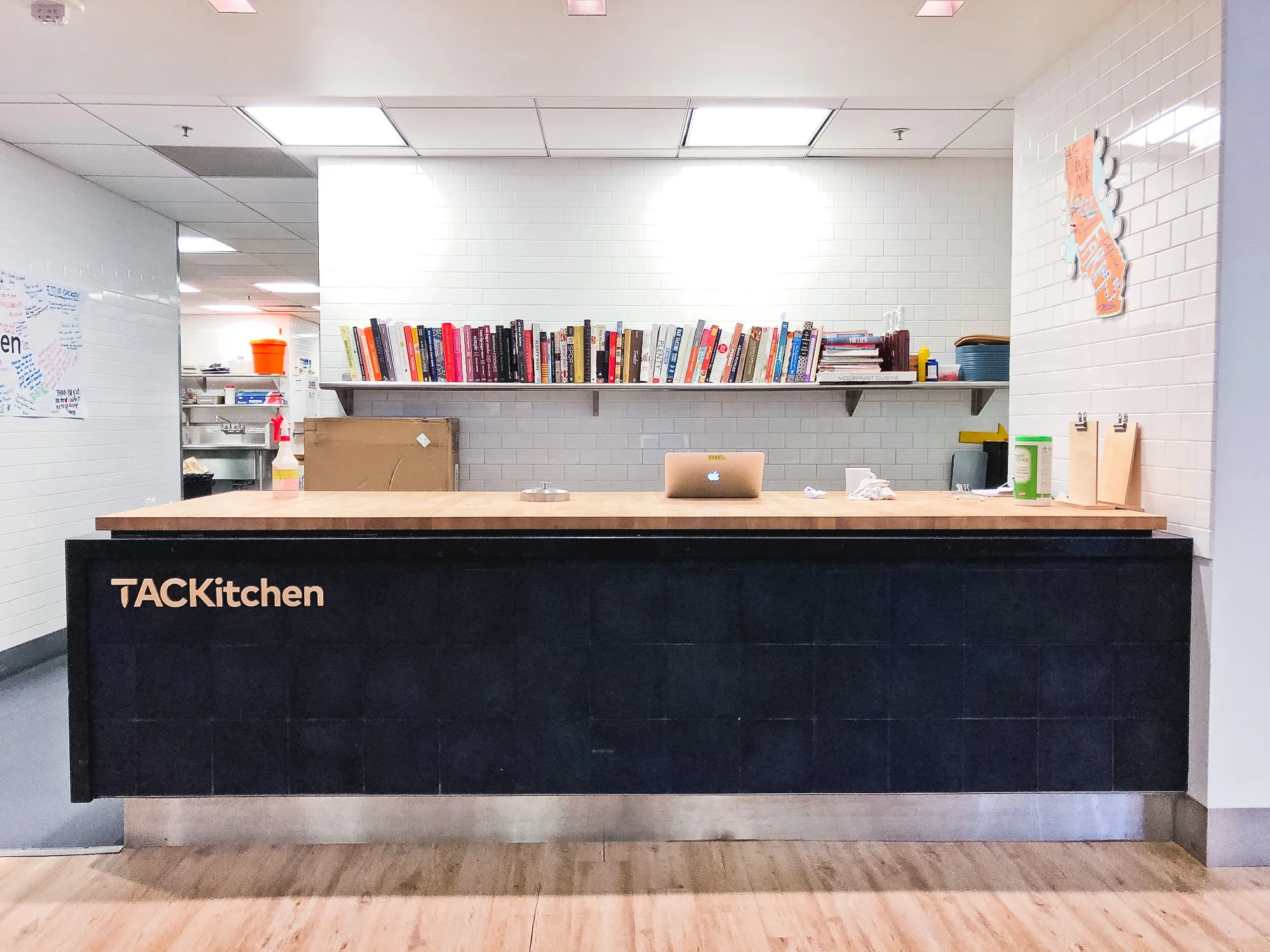 A custom logo was created for our beloved TACKitchen, and is proudly mounted on the kitchen’s front desk area.