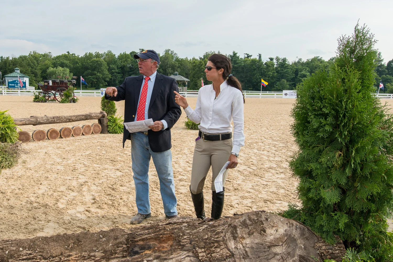 Jack Towell and daughter Liza Boyd walking the course during the 2013 USHJA International Hunter Derby Championship.