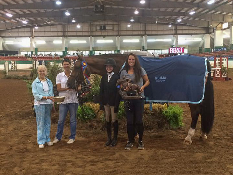 Grace Howard and Bethel's Peri collected the Grand Junior Hunter Championship at NCHJA.