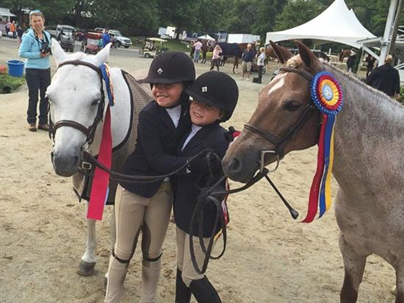 Catherine Sharp and Zola Thompson celebrate their championships!