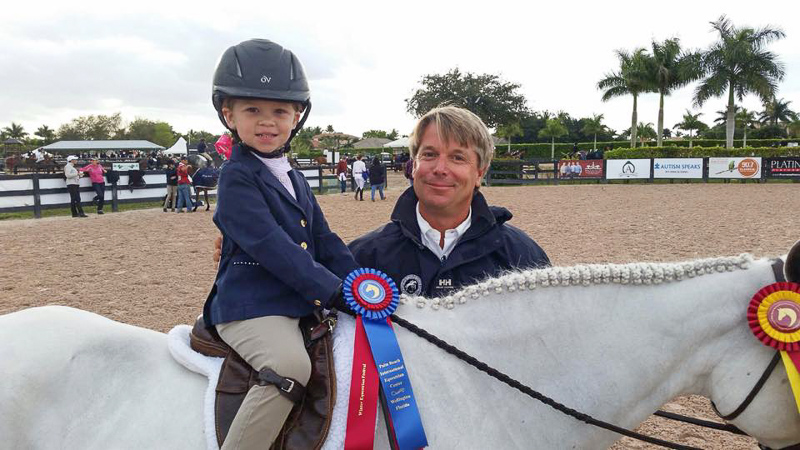 Elle Boyd and trainer Charlie Moorcroft