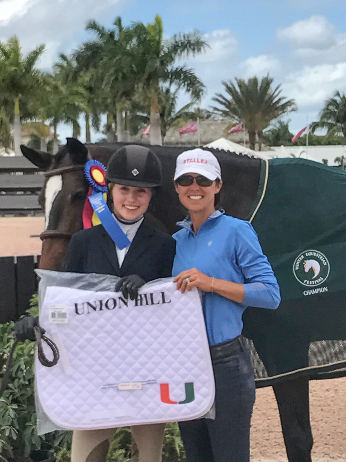Maggie Hill and Co Co Chanel with trainer Liza Boyd.