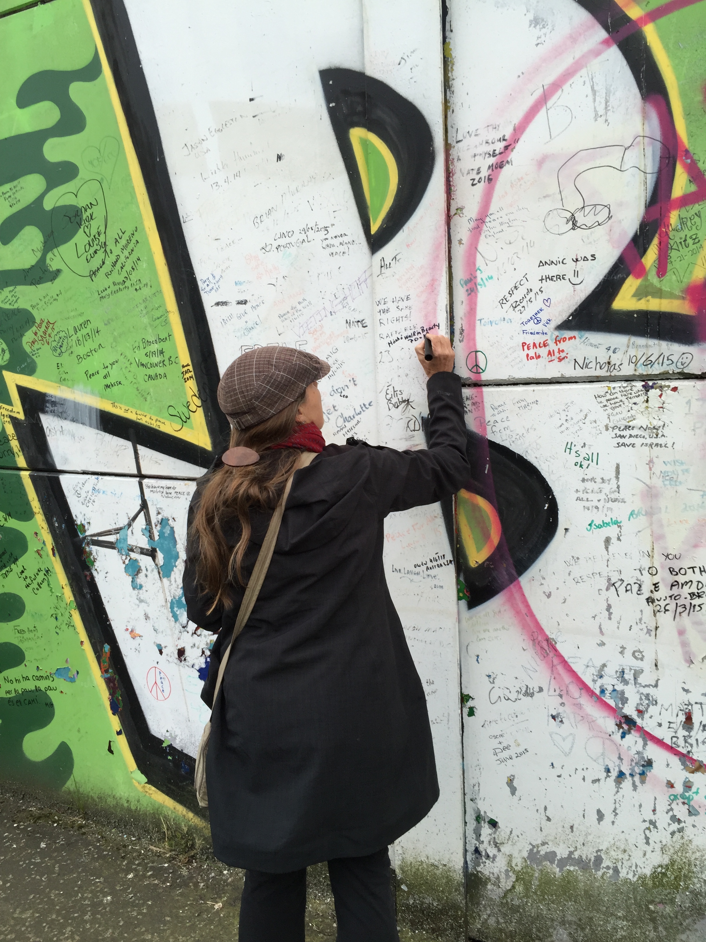 Me signing Peace Wall in Belfast.