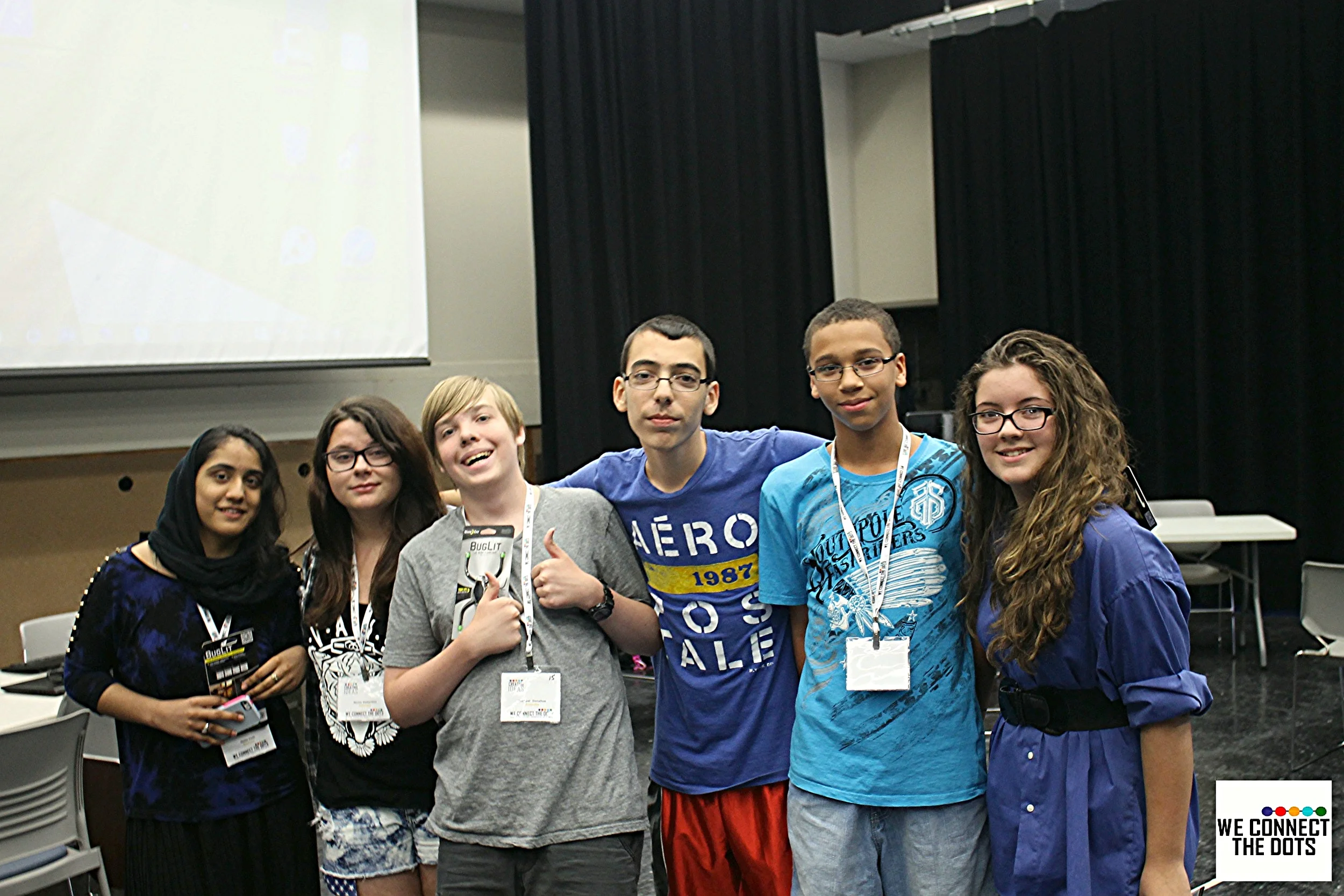 Student prizewinners posing for a group photo on the last day of the conference