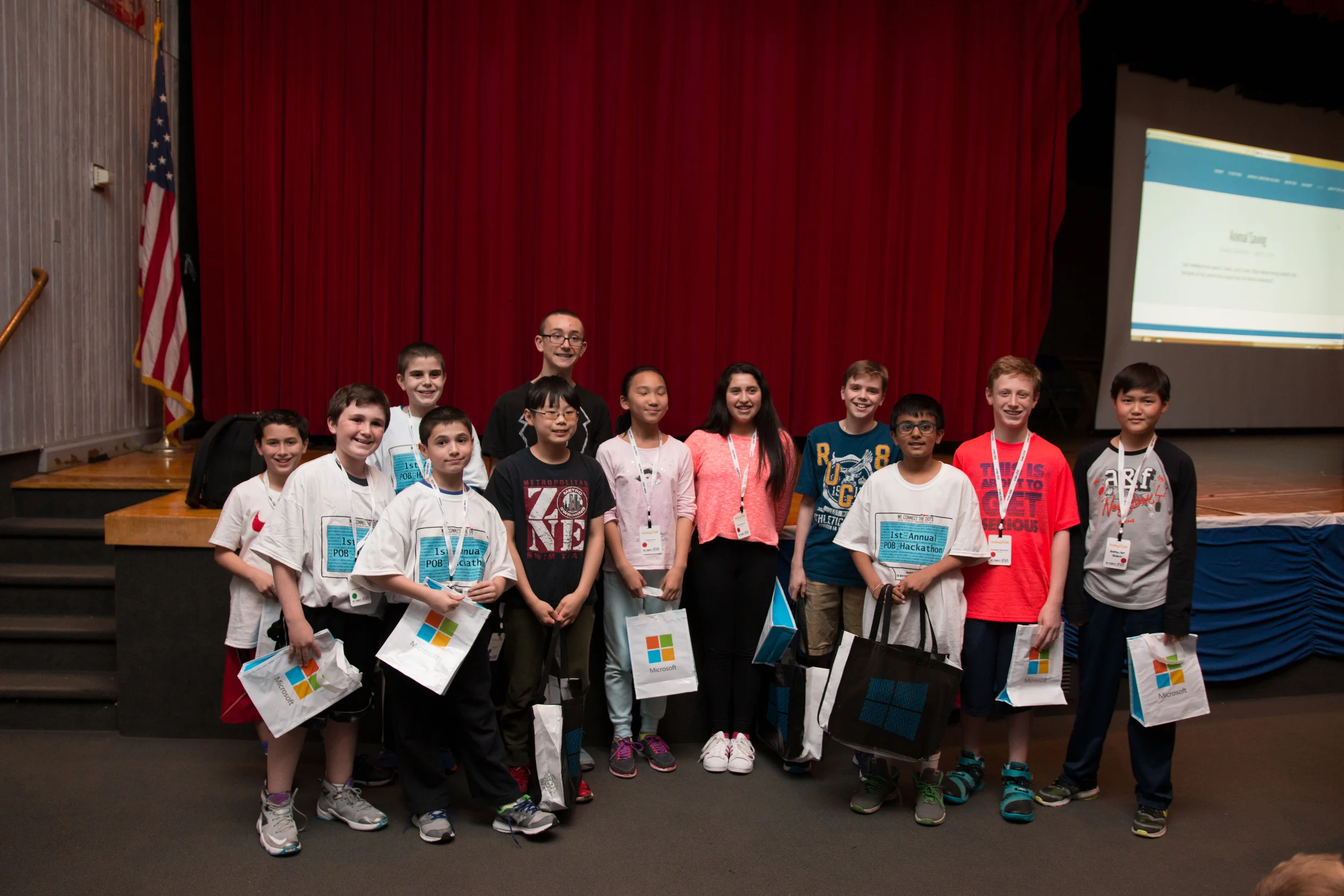 The winning teams pose for a photo at the end of the day's presentations