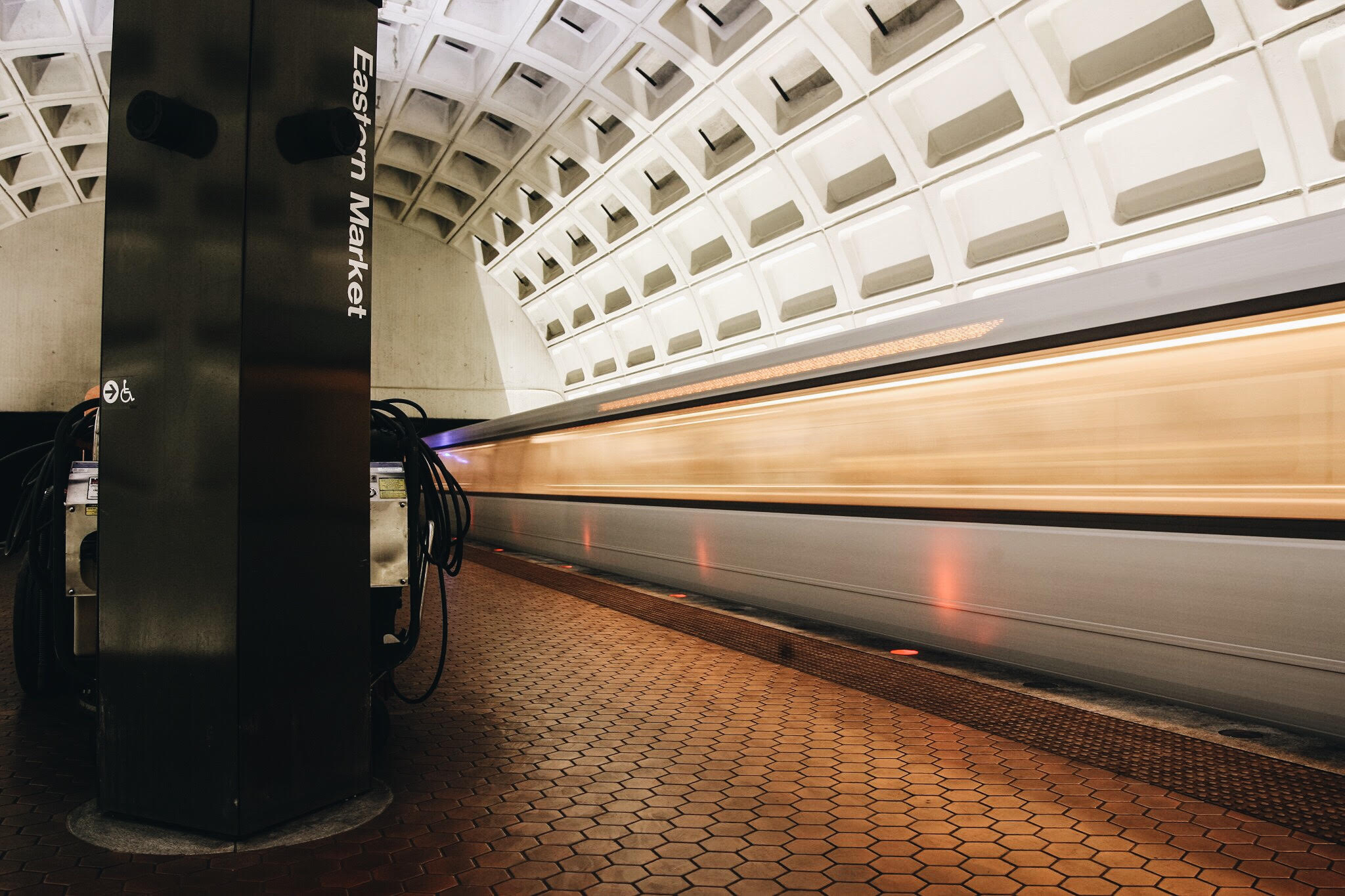 A 2001 CAF 5000 series railcar departs Eastern Market