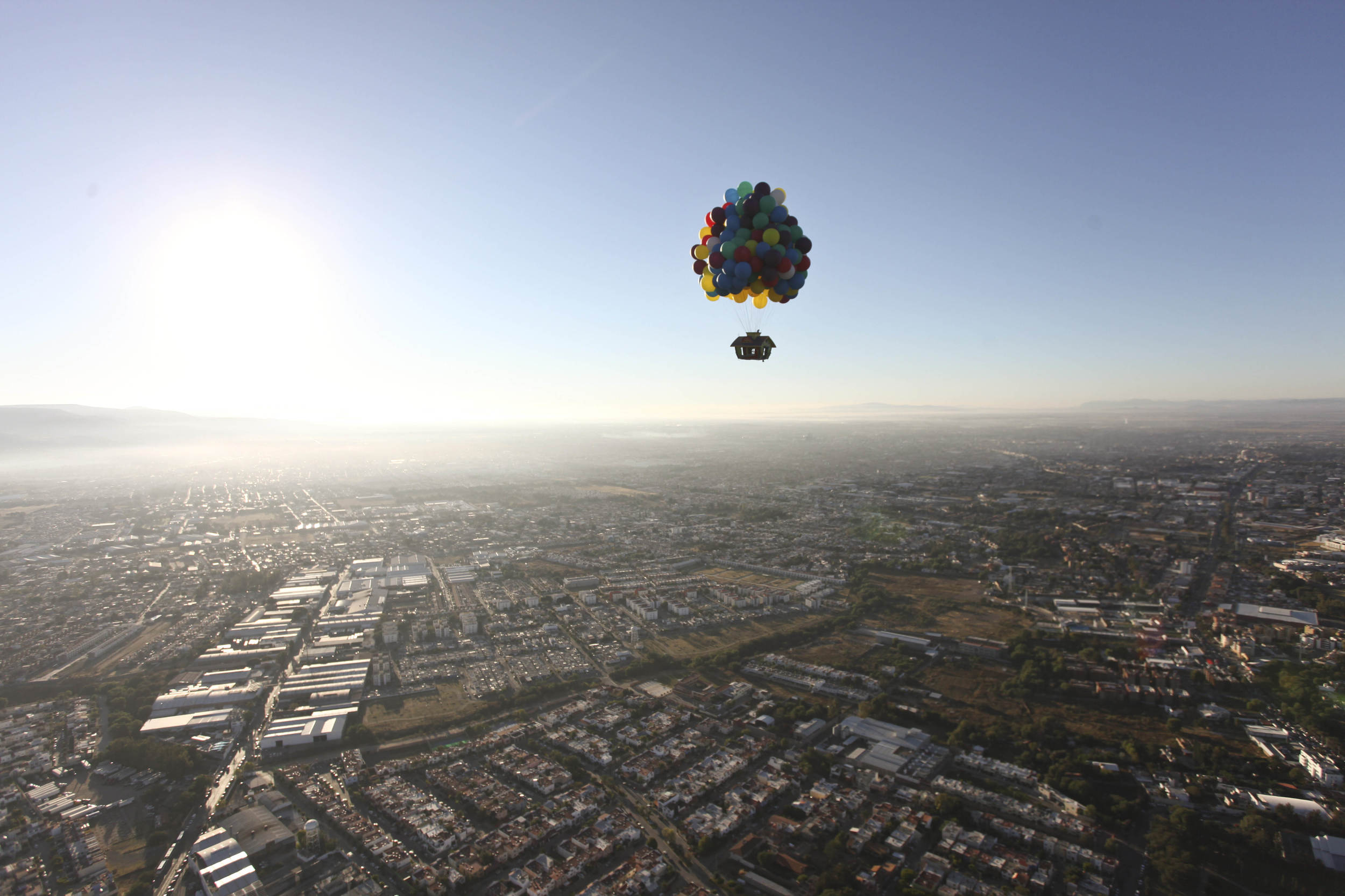 Up... up and away: Adventurer takes to the skies in a REAL balloon house