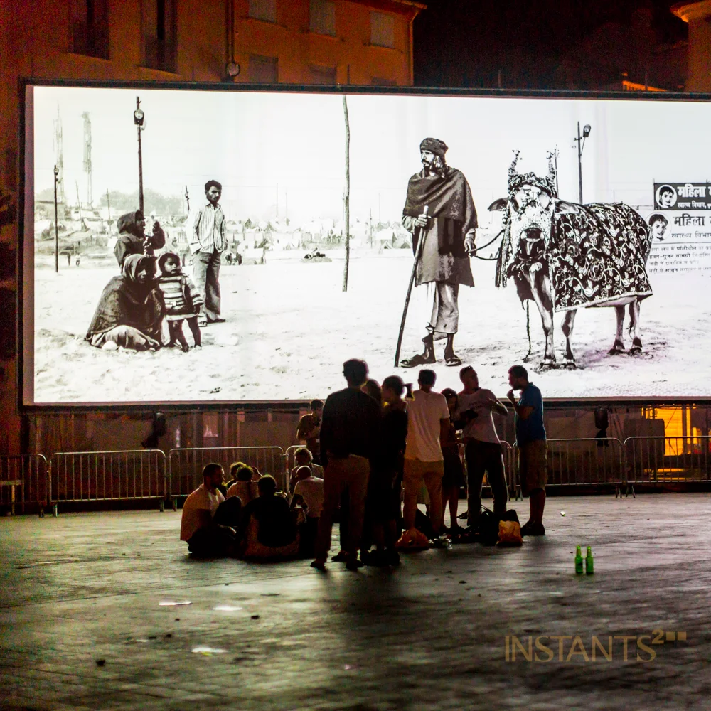 Perpignan, France - 06.09.2013 : People discussing late at night @ Place de la République @ Visa pour l'image, Perpignan. 