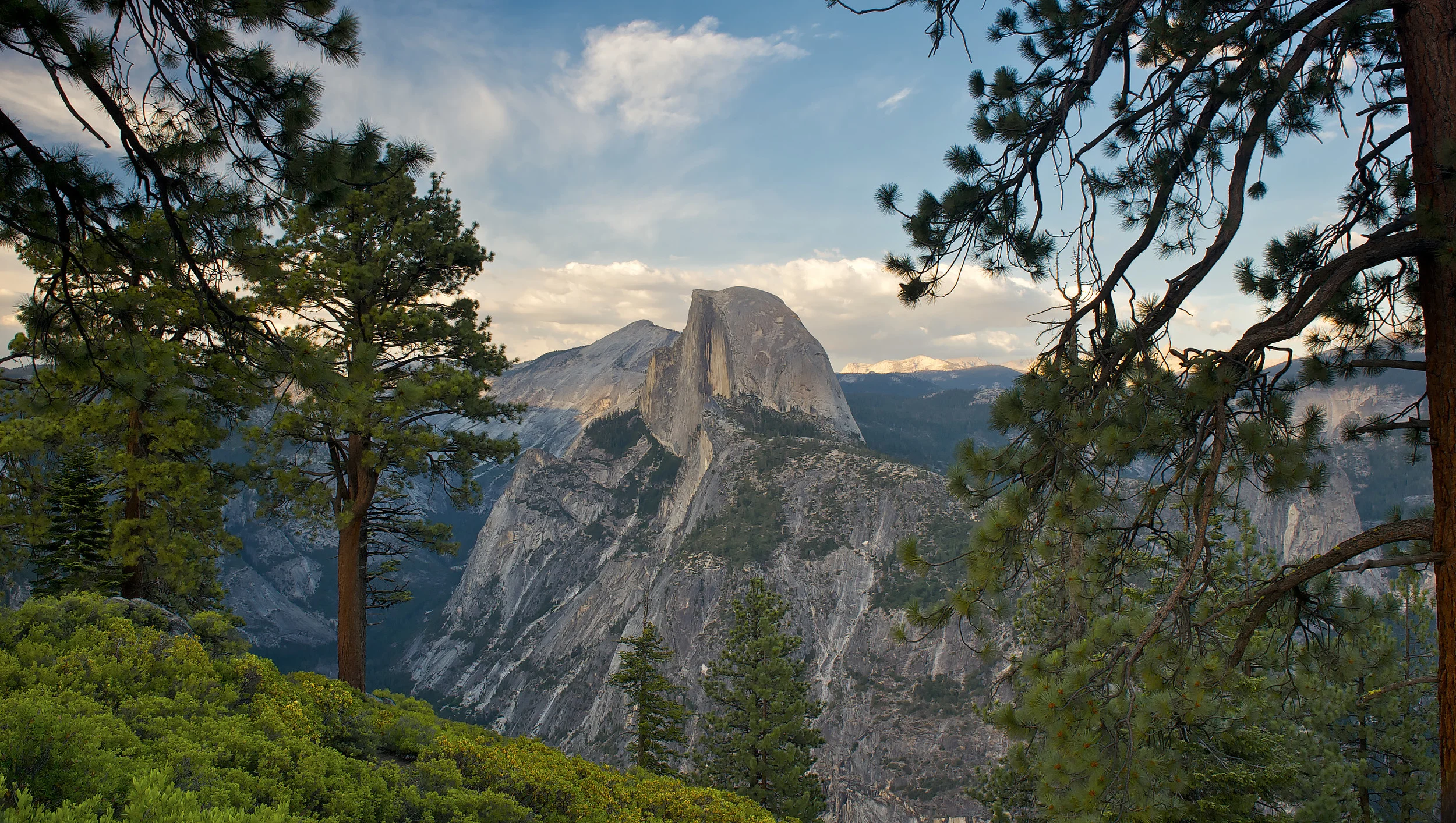 Half Dome and Cloud's Rest at sunset as seen from Glacier Point, Yosemite, California, USA