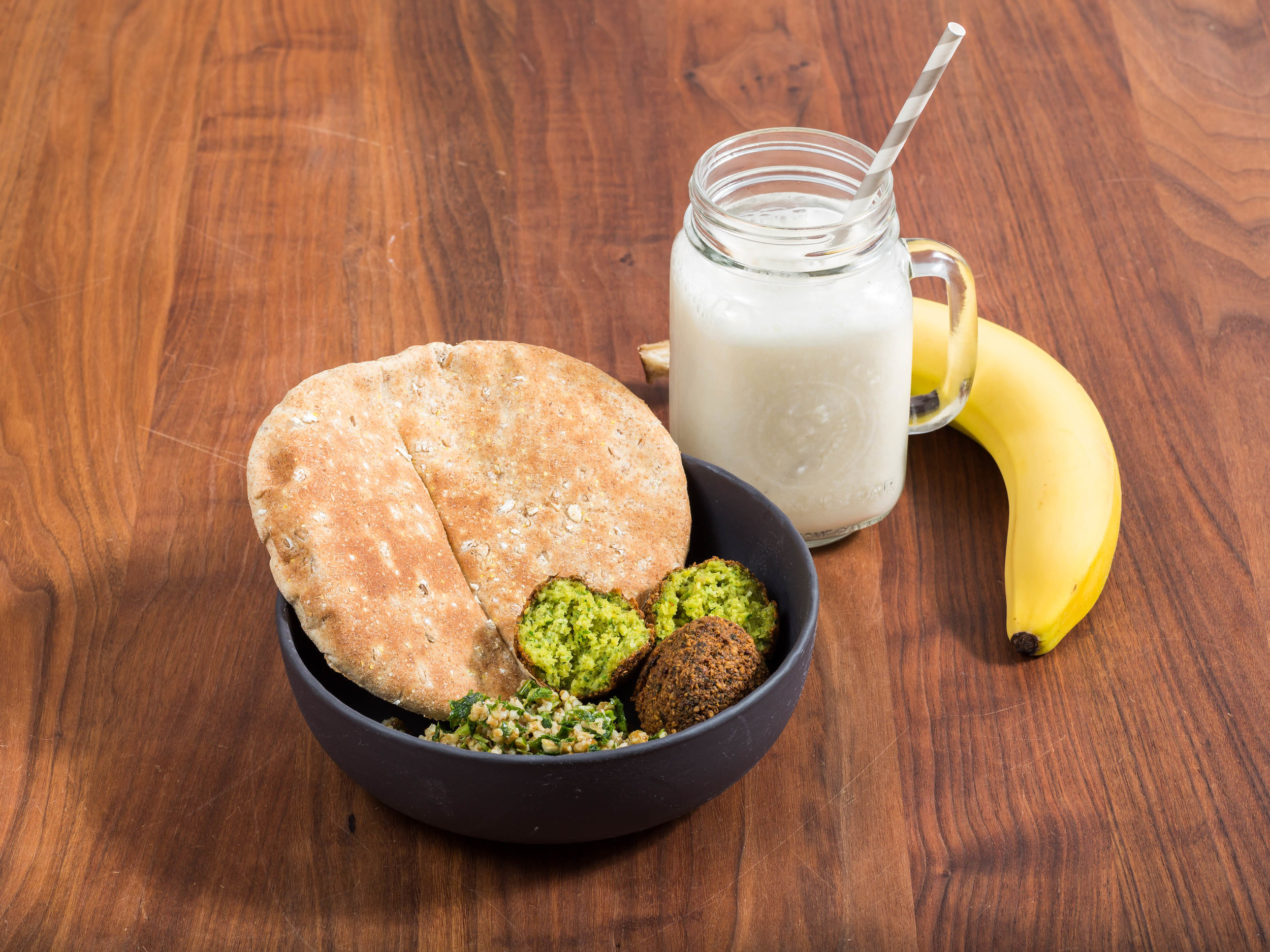 Falafel, with pita bread and banana milkshake.
