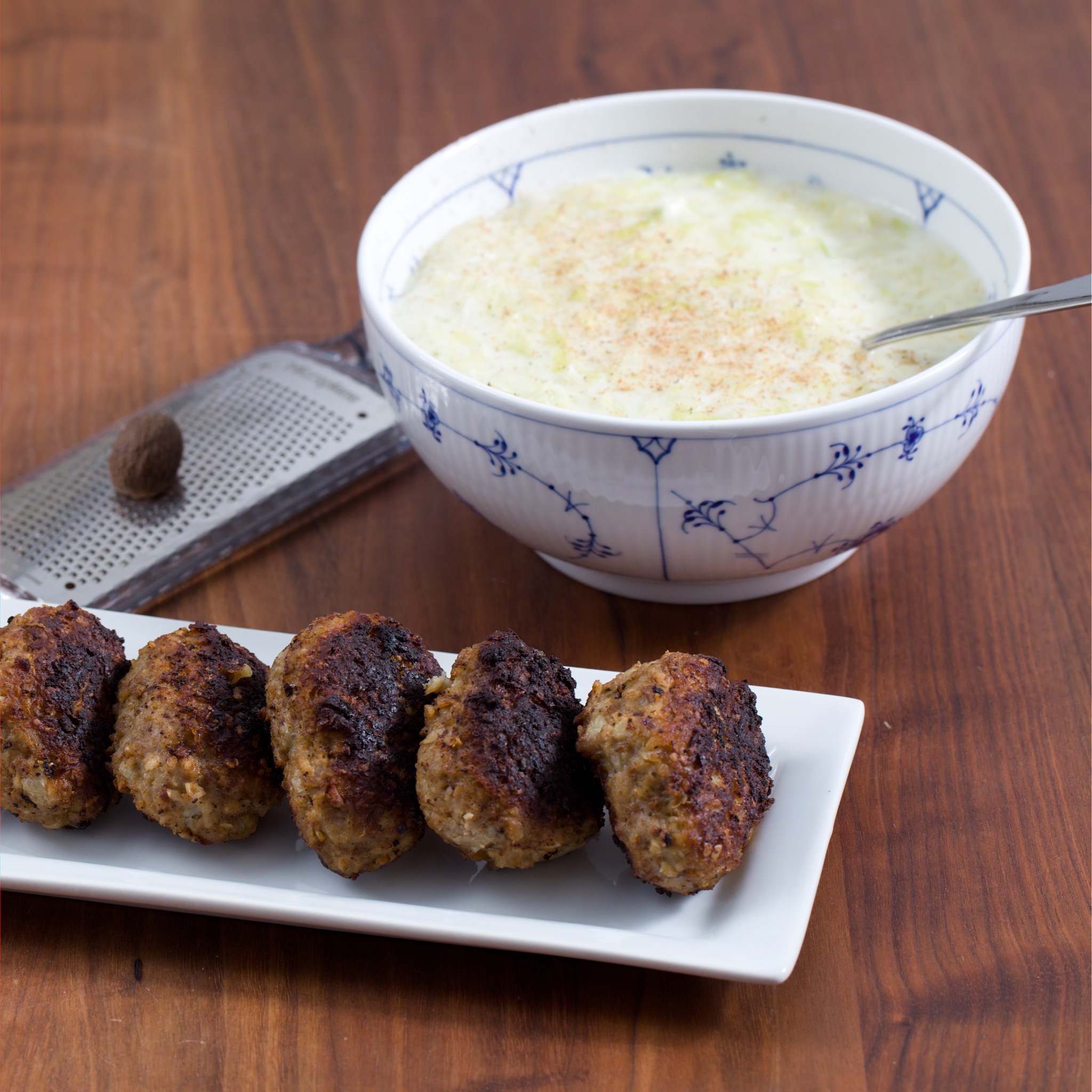 Classic Danish Meatballs with creamed green cabbage.