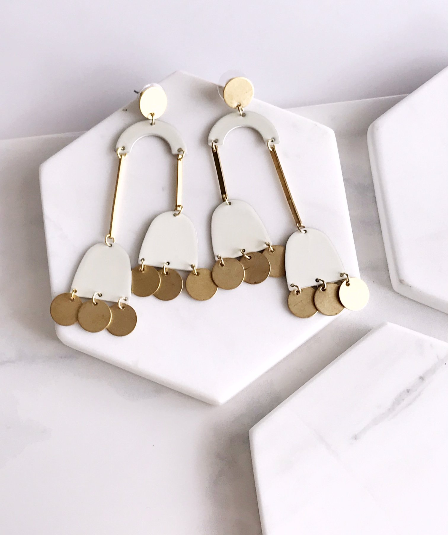 milk earrings.jpeg