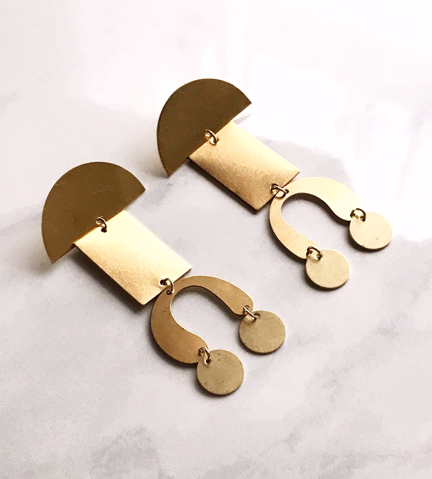 totem earrings.jpeg