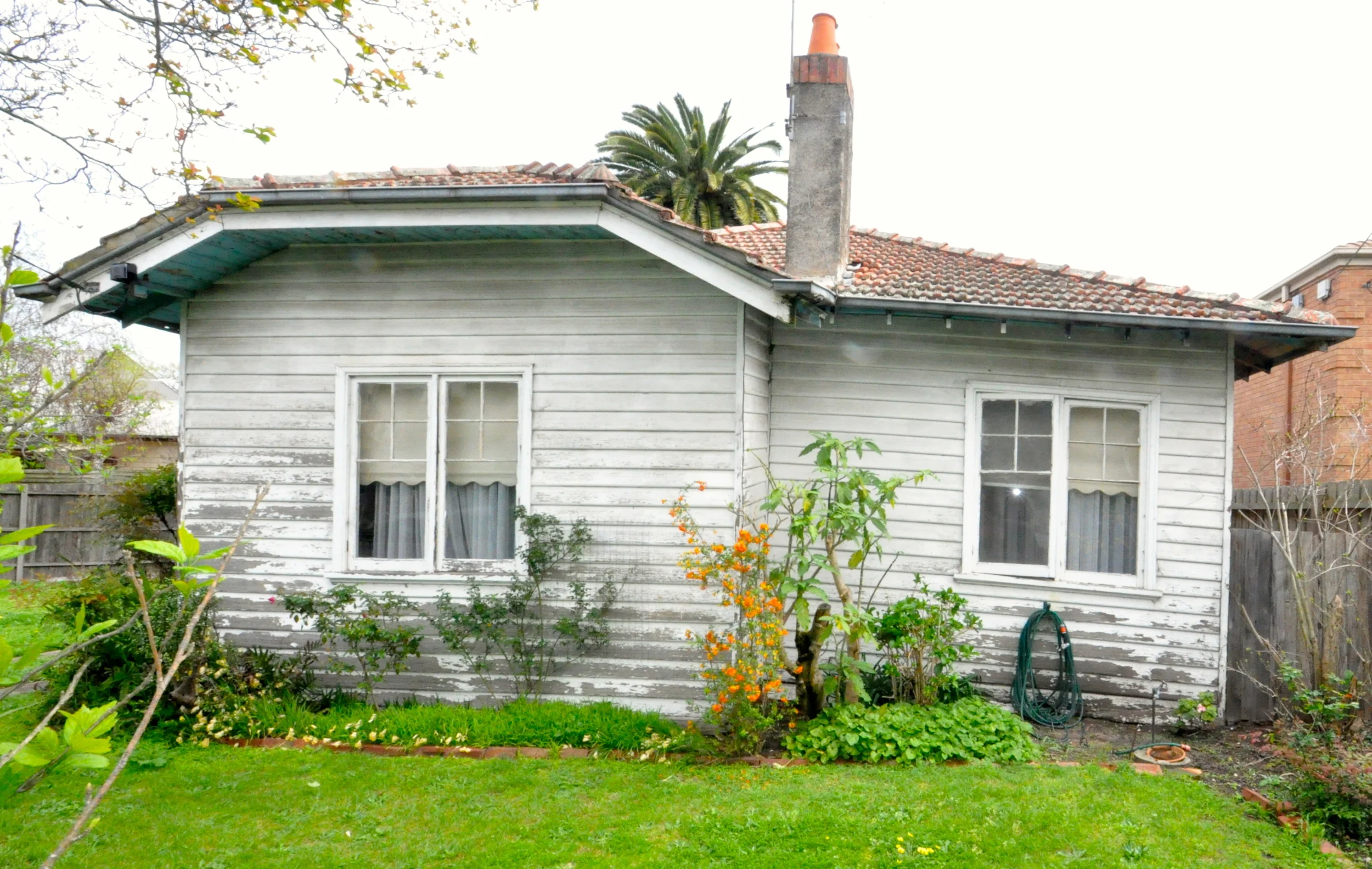 Sad old weatherboard home, better call the inspector!
