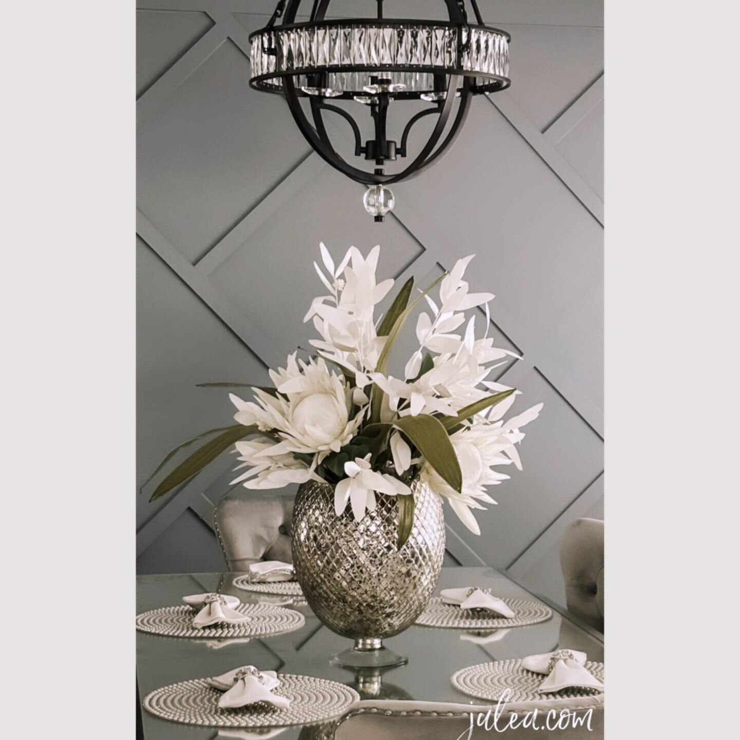 Another beautiful custom floral for a client.  We perfectly curate spaces with your personality + lifestyle in mind abd execute your vision. #professionalshopper #homedecor #homeaccents #customflorals #whiteflowers #floral #mercuryglass #curatedhome 