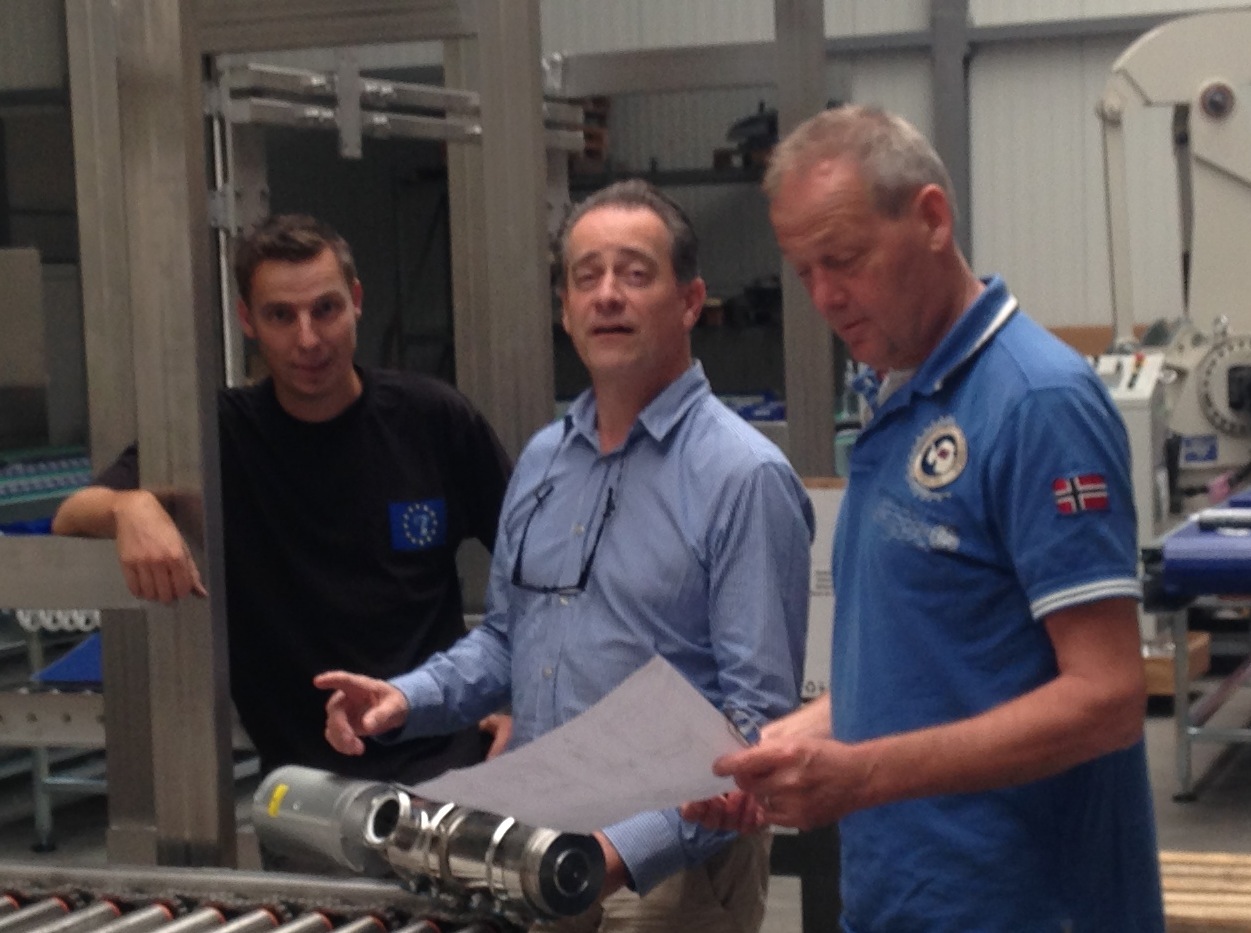 Jan, Patrick and Hans discussing together a new customized filling line.