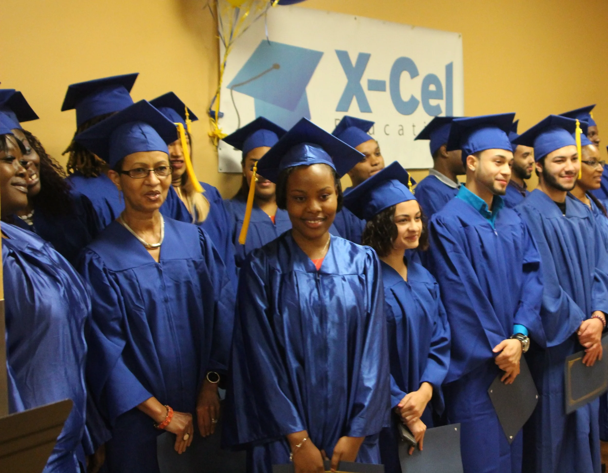 X-Cel Education's free high school equivalency and college prep classes, college guidance, and career programs help hundreds of low-income Bostonians each year attain an education and better jobs to support their families.