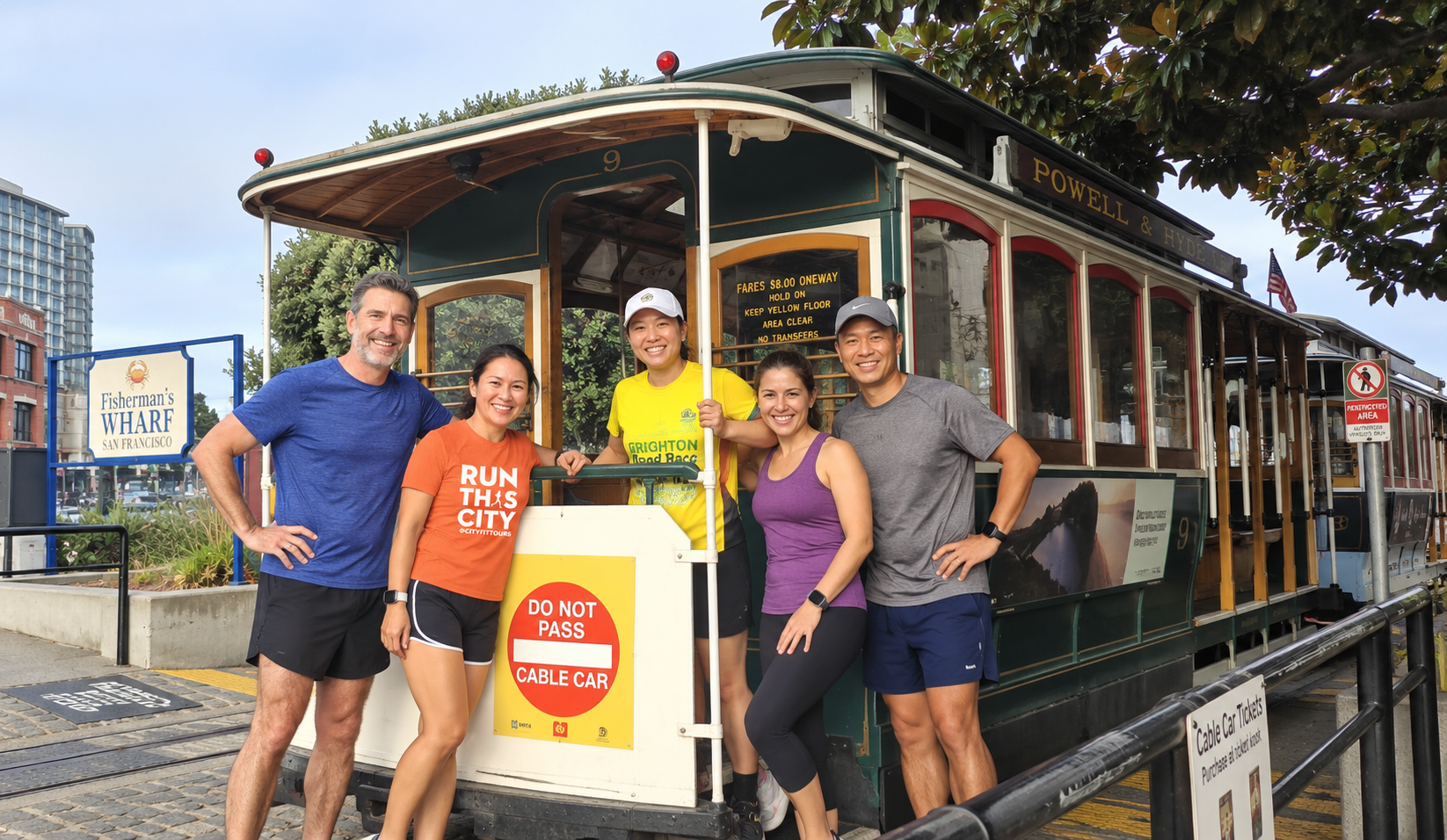 Runners in San Francisco in front of Trolley in FIsherman's Wharf