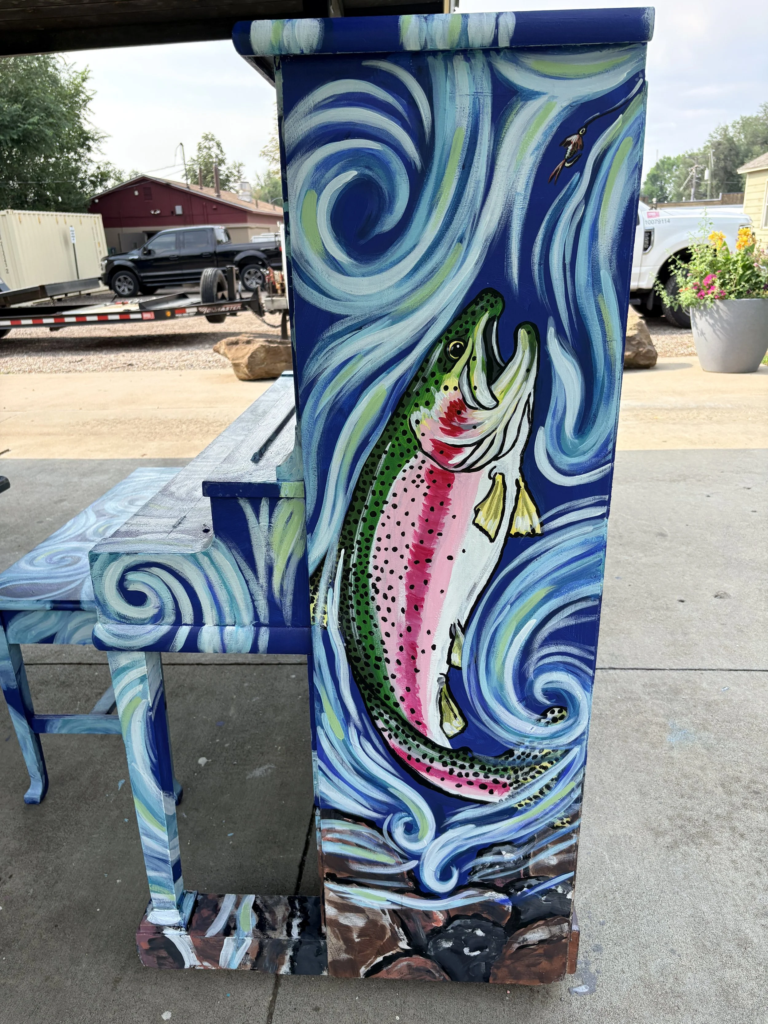  This painted piano was done in outdoor acrylic paint and resides in Centennial Park in Wellington, CO 