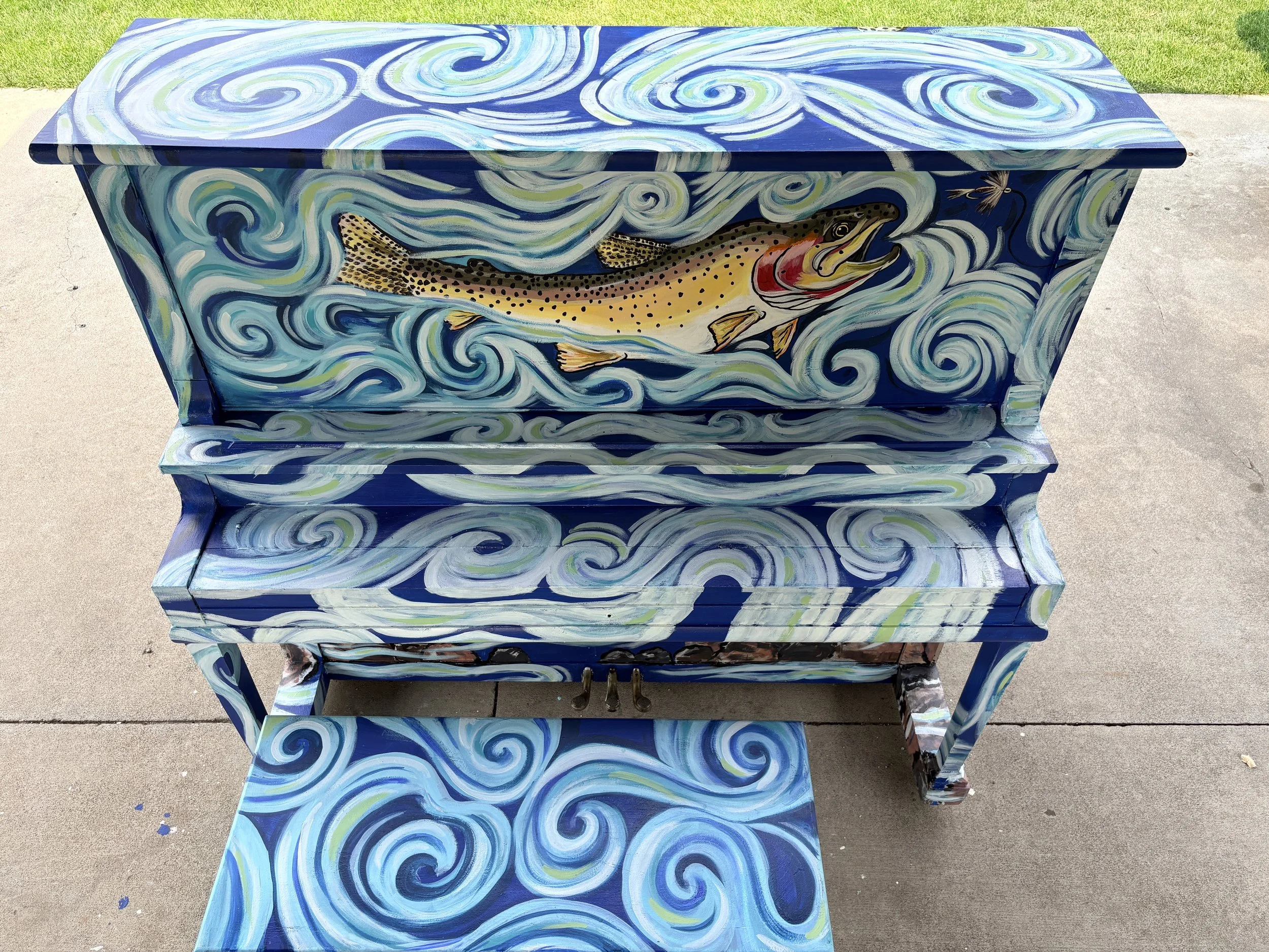 This painted piano was done in outdoor acrylic paint and resides in Centennial Park in Wellington, CO 