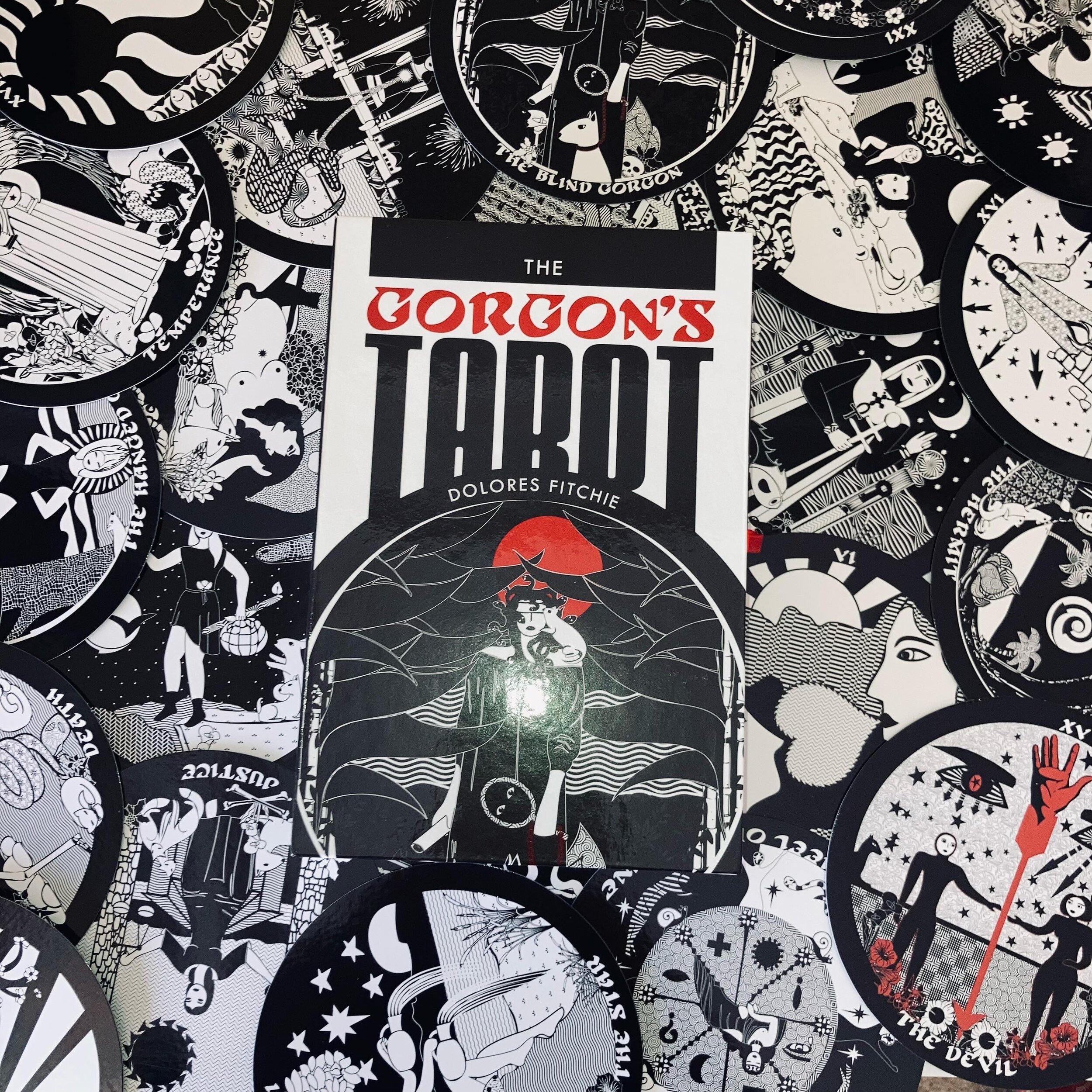 IN THE SHOP: The Gorgon&rsquo;s Tarot by Dolores Fitchie &amp; @redfeather.mbs; a round, black and white (with a little red) tarot deck
.
&ldquo;Unabashedly feminine and a restrained paean of praise to the animal kingdom, it features a largely female