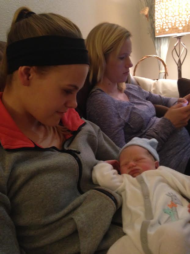 I can't stop looking at this precious baby. (That's mommy in the background.)