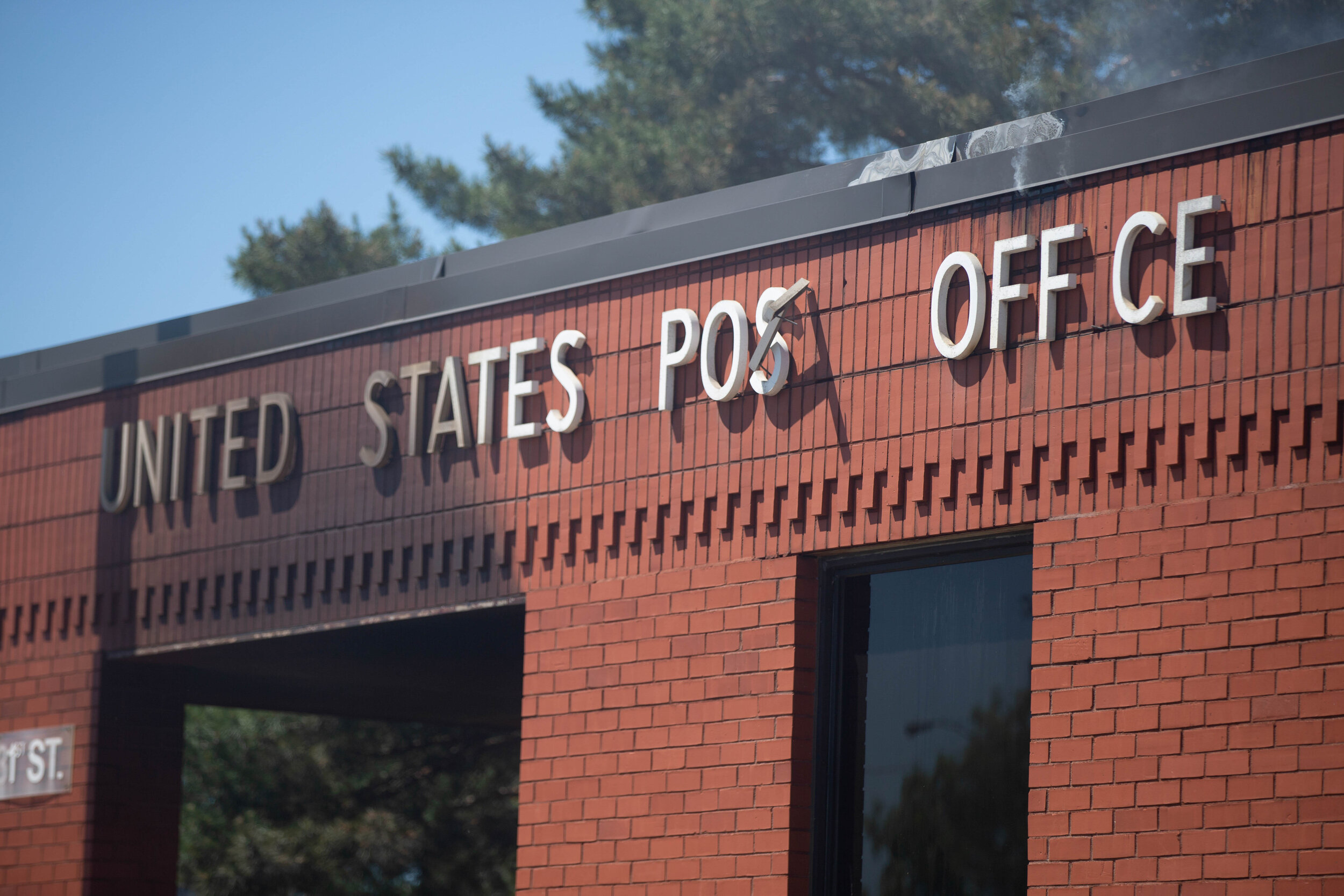  Nearly falling off the building, the t in "post office" nearly fell off during a fire started by a riot in Minneapolis, Minnesota over the police killing of George Floyd on May 30, 2020. Chris Juhn/Zuma. 