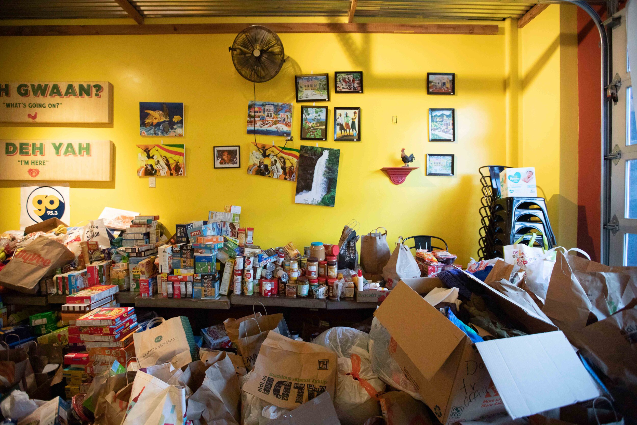  Food sits in the main seating area of Pimentos Jamaican Kitchen that was donated to be given away to people in need in Minneapolis, Minnesota on may 30, 2020, Chris Juhn/Zuma. 