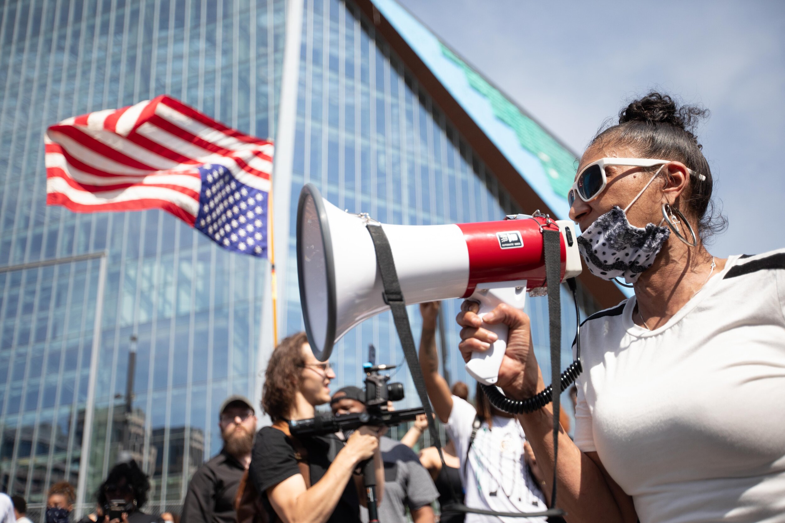  A protester screams into the microphone during a protest over the police killing of George Floyd in front of the U.S. Bank Stadium in Minneapolis, Minnesota on May 31, 2020. Chris Juhn/Zenger 