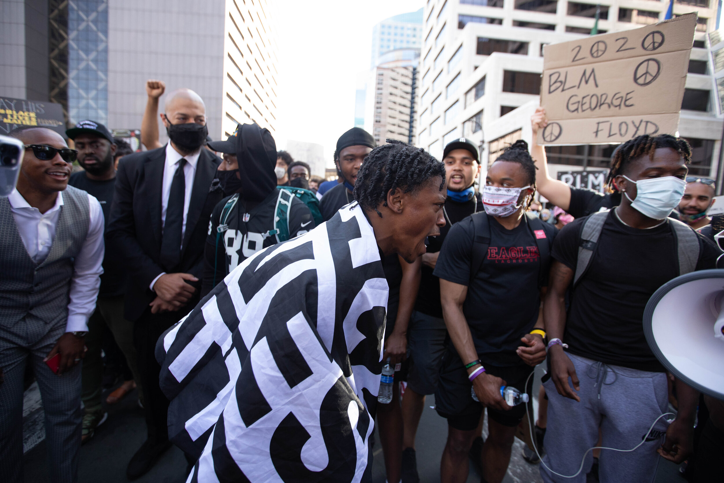  A protester starts chanting, eventually getting a the entire crowd of protesters to chant with him while they protested the police killing of George Floyd in Minneapolis on May 31. 