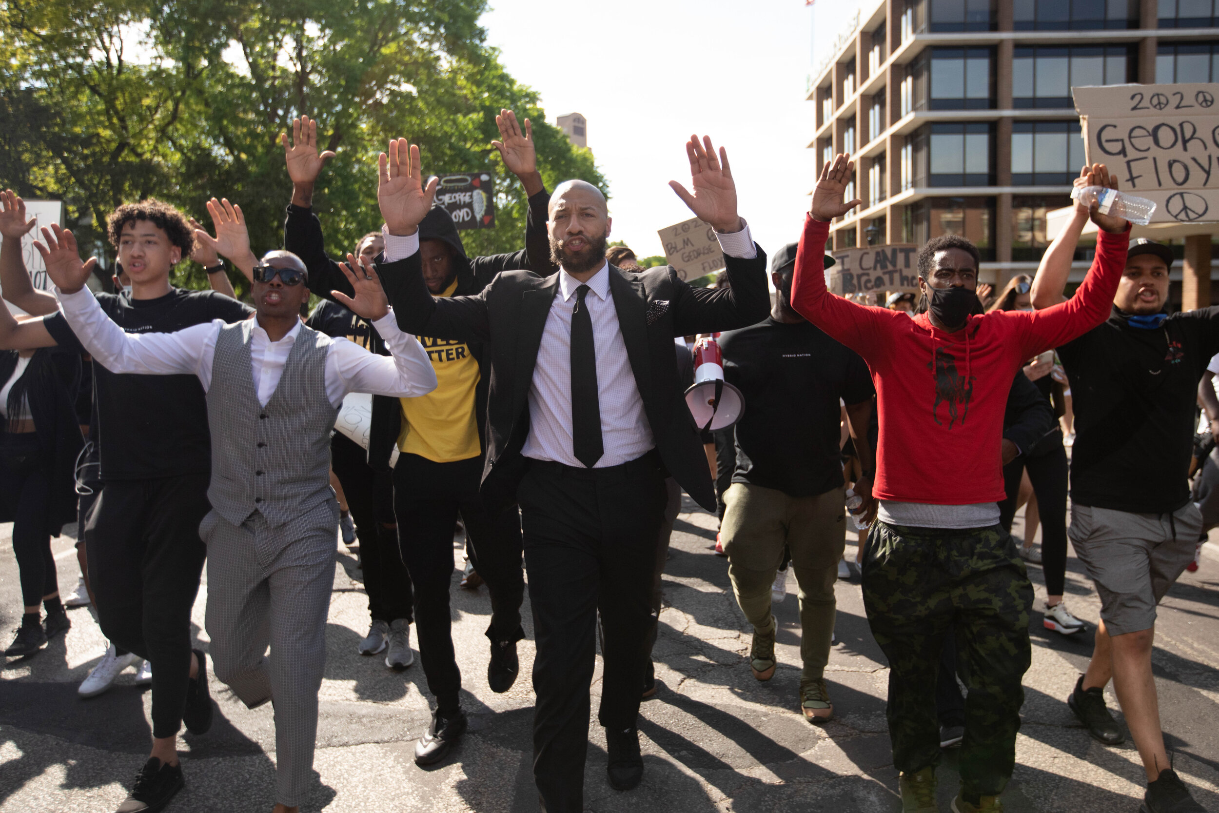  "Hands up, don't shoot," was chnated by protesters as athletes led protesters down University Avenue in Minneapolis, Minnesota while protesting the police killing of Geroge Floyd on May 31, 2020. Chris Juhn/Zenger 