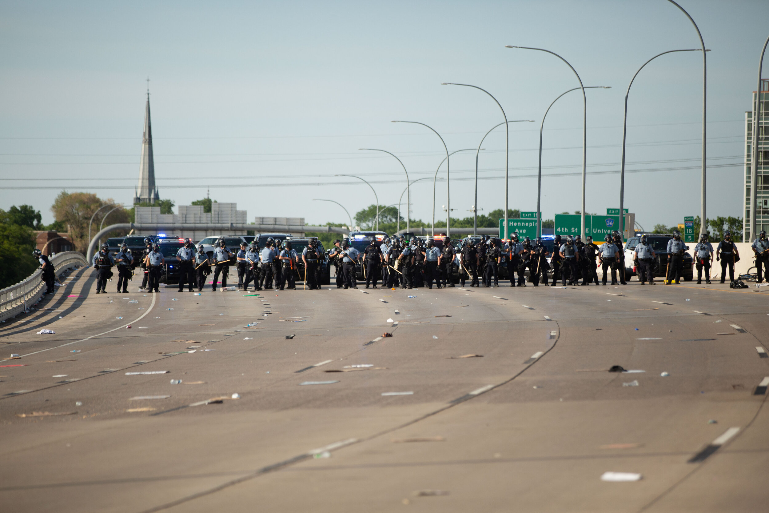  Police form a line to clear protesters from intestate 35w in Minneapolis, Minnesota after a driver haulign fuel drove through a crowd of protesters on May 31, 2020. Chris Juhn/Zenger 